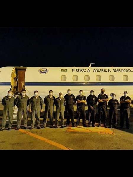 Policiais e oficiais da FAB usaram máscaras contra coronavírus na operação - Divulgação/MJ