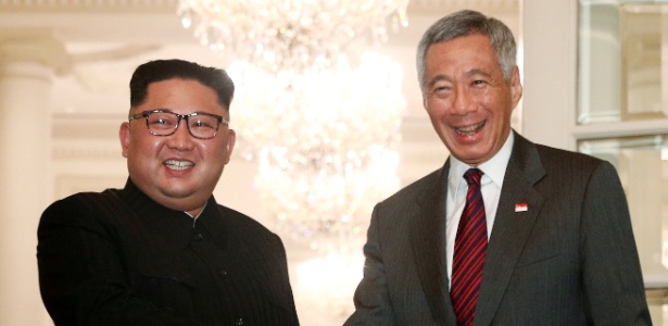 Kim Jong-un e o primeiro-ministro de Singapura, Lee Hsien Loong, neste domingo - Edgar Su/Reuters