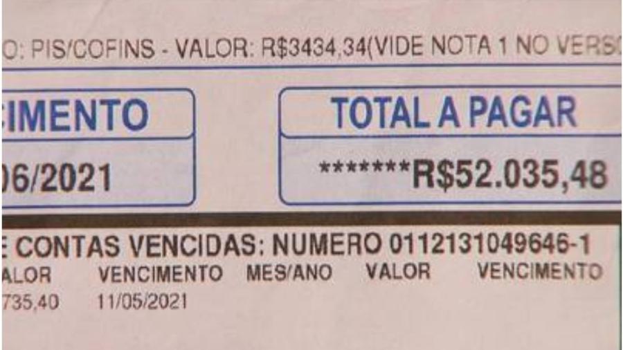 Moradores questionam valor de R$ 52 mil na conta de água - Reprodução: Record TV Minas