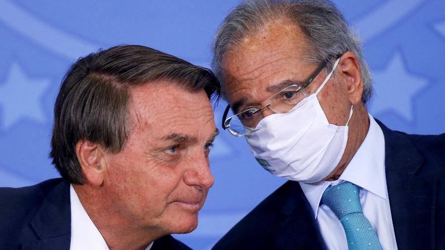 Presidente Jair Bolsonaro (PL) e o ministro Paulo Guedes - Adriano Machado/Reuters