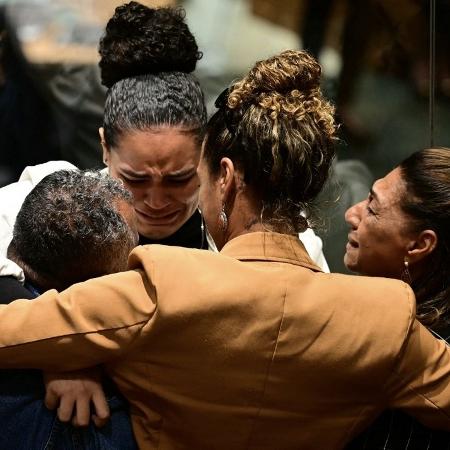 O pai, a mãe, a filha e a irmã de Marielle Franco, a ministra Anielle Franco, no final do julgamento - Pablo Porciuncula / AFP