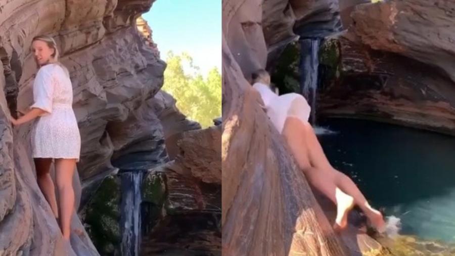 Alex Baxter leva tombo enquanto tenta posar para foto em uma cachoeira no Parque Nacional Karijini, na Austrália. - Reprodução/Youtube