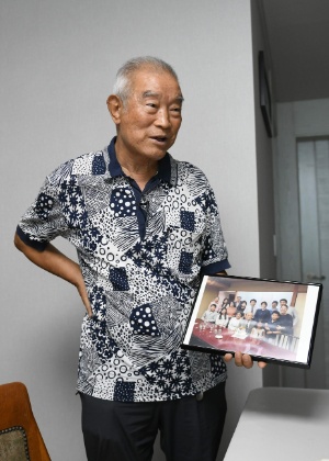 Kim Kwang-ho é um dos sorteados para rever a família que ficou na Coreia do Norte - Jung Yeon-je/AFP