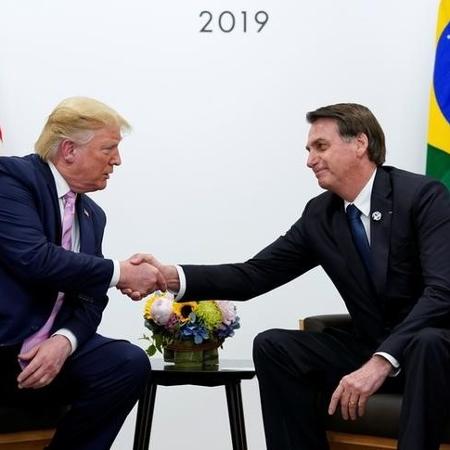 Presidentes Donald Trump e Jair Bolsonaro durante reunião bilateral às margens do G20 em Osaka, no Japão - KEVIN LAMARQUE