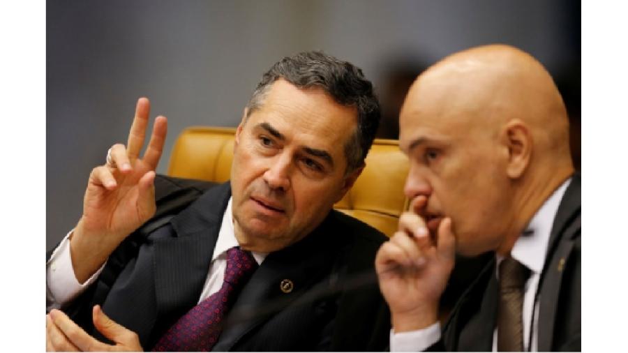 Barroso, que deixa o TSE no dia 22, e Alexandre de Moraes, que presidirá o tribunal durante as eleições. As falas são claras: crimes serão punidos - Reprodução