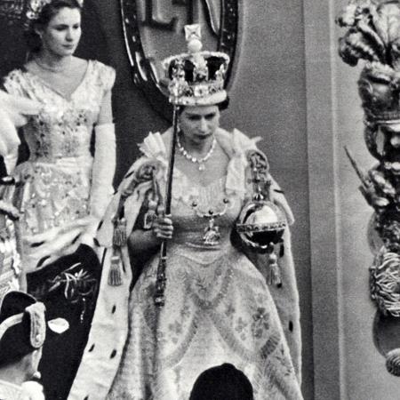 Queen Elizabeth holds a scepter at her coronation, with the Star of Africa in her right hand.  - Getty Images - Getty Images