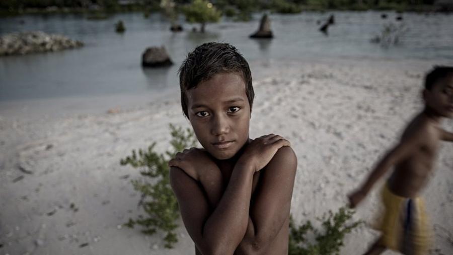 Acredita-se que as ilhas de Kiribati serão engolidas pelo oceano em 10 ou 15 anos, deixando sem lar as mais de 100.000 pessoas que vivem nelas - Getty Images/BBC