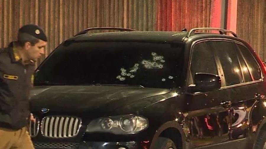 Casal em BMW morre com tiros de fuzil em Curitiba - Reprodução/RIC