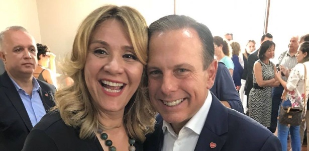 A agora ex-diretora da Ilumine, Denise Abreu, com o prefeito João Doria (PSDB) - Reprodução/Facebook