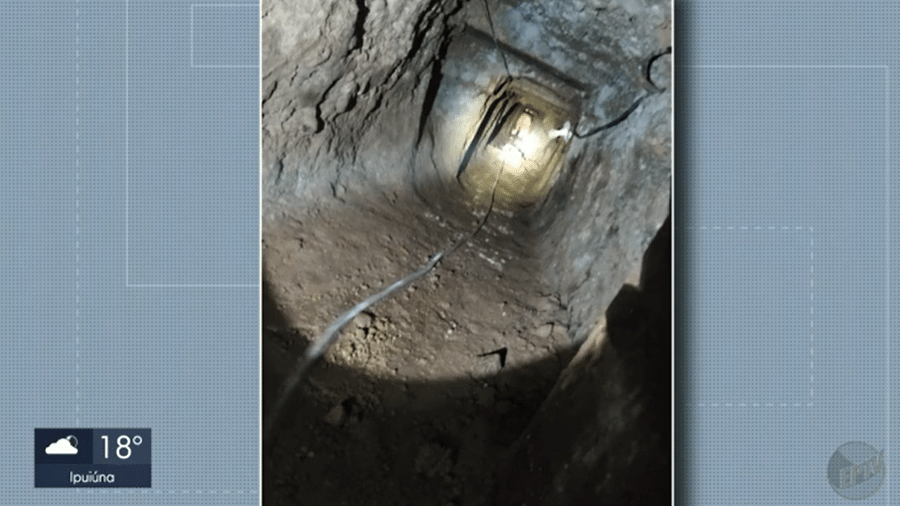 Túnel de pelo menos 40 metros foi descoberto em uma área de bancos em Poços de Caldas (MG) - Reprodução/EPTV