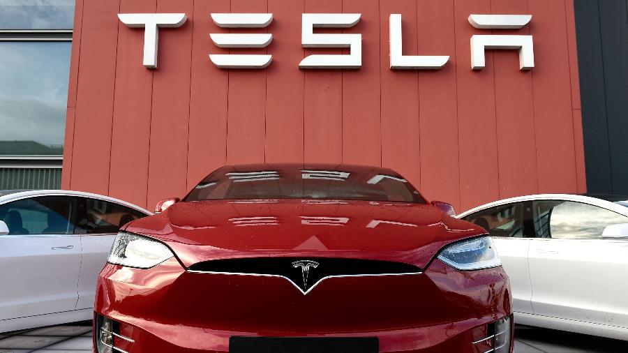 Tesla vira montadora mais valiosa dos EUA - John Thys/AFP