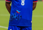 Como foi a batalha representada na camisa do Haiti que irrit