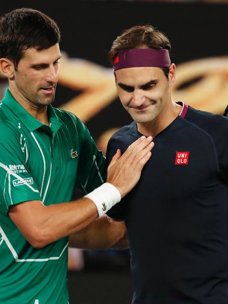 Novak Djokovic e Roger Federer após partida do Aberto da Austrália - Issei Kato