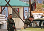 Ataques e desconfiança dificultam fuga de civis durante trégua em região síria - AFP