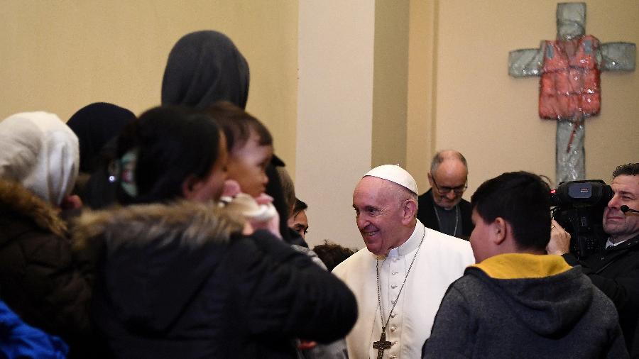 O papa Francisco recebeu refugiados no Vaticano em 19 de dezembro - ANSA/ETTORE FERRARI/Pool via REUTERS