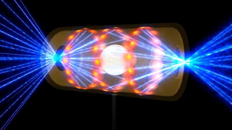 Ilustração do LLNL mostra raios lasers penetrando no hohlraum; eles aquecem e comprimem os isótopos de hidrogênio na cápsula até as condições necessárias para que a fusão nuclear ocorra - Lawrence Livermore National Laboratory