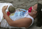 Mulher dá à luz em calçada de avenida no centro de João Pessoa - Reprodução/TV Cabo Branco