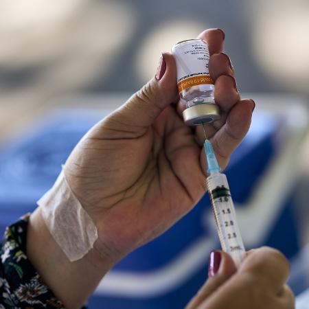 Uma dose de vacinas reduz infecção em até 65% - IGOR DO VALE/ESTADÃO CONTEÚDO