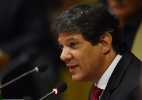 Dilma deve recalibrar economia, diz Haddad - Gabriel Bouys/AFP