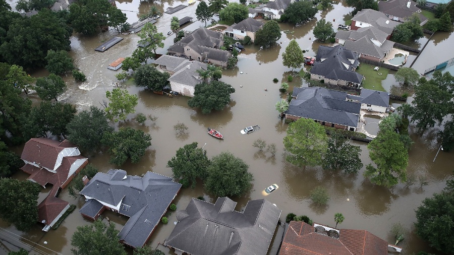Casas inundadas em decorrência da tempestade tropical Harvey nos Estados Unidos - Win McNamee/AFP Photo