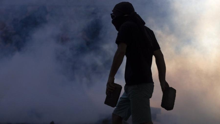Para Müller, os saques, incêndios e ataques à infraestrutura pública são uma demonstração de que hoje, no Chile, impera a anarquia - Getty Images