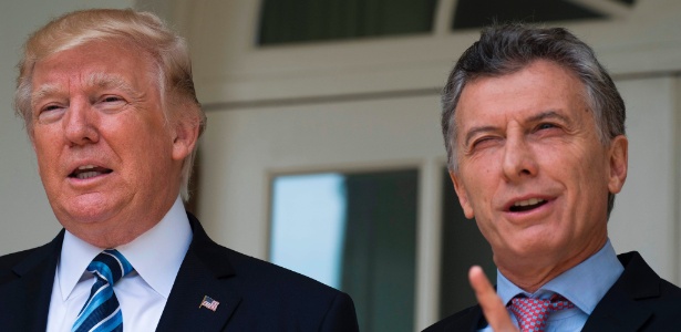 Donald Trump (esq.), presidente dos EUA, recebe o argentino Mauricio Macri - Jim Watson/AFP