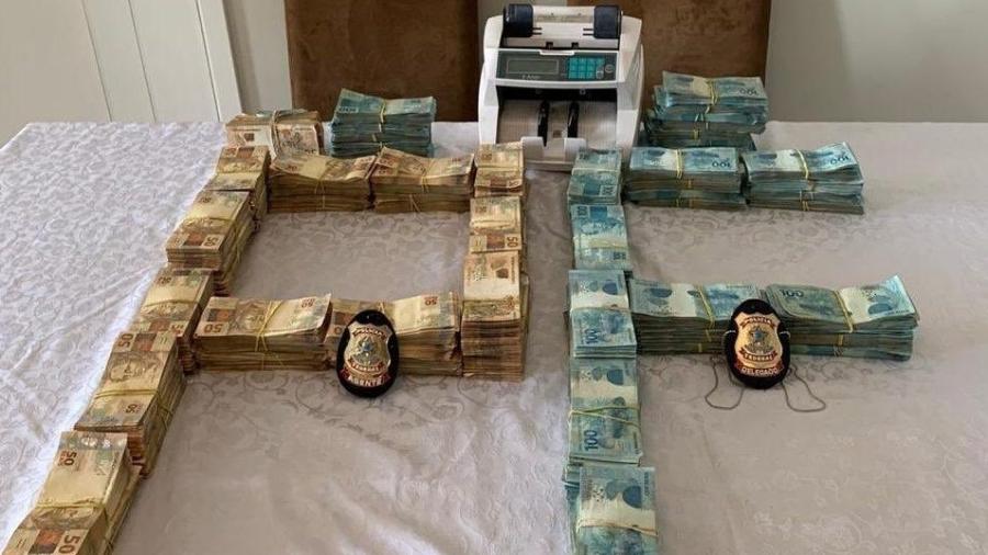 PF encontrou R$ 750 mil em caixa térmica na casa de investigado - Divulgação/PF