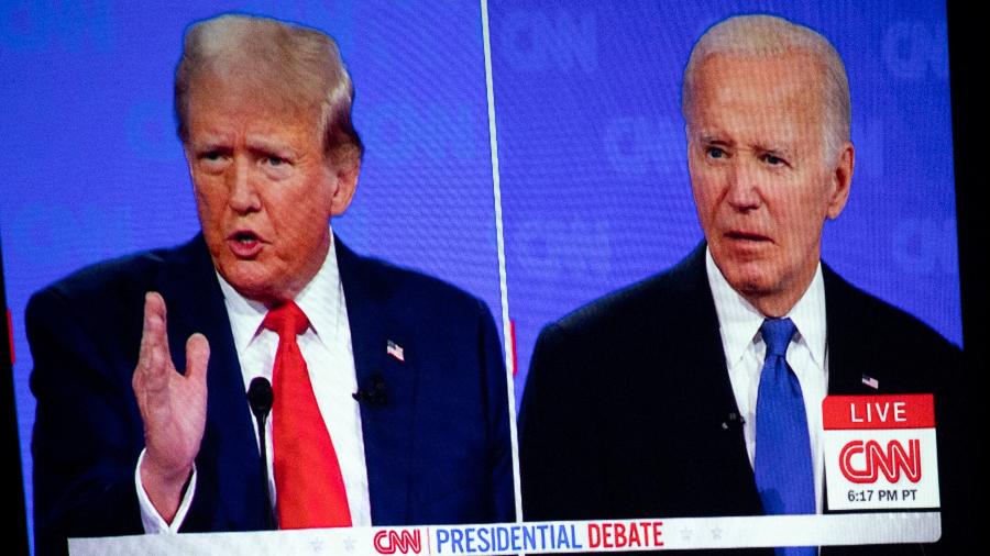 27.jun.2024 - Donald Trump e Joe Biden durante debate transmitido pela CNN nos EUA - Por Helen Coster