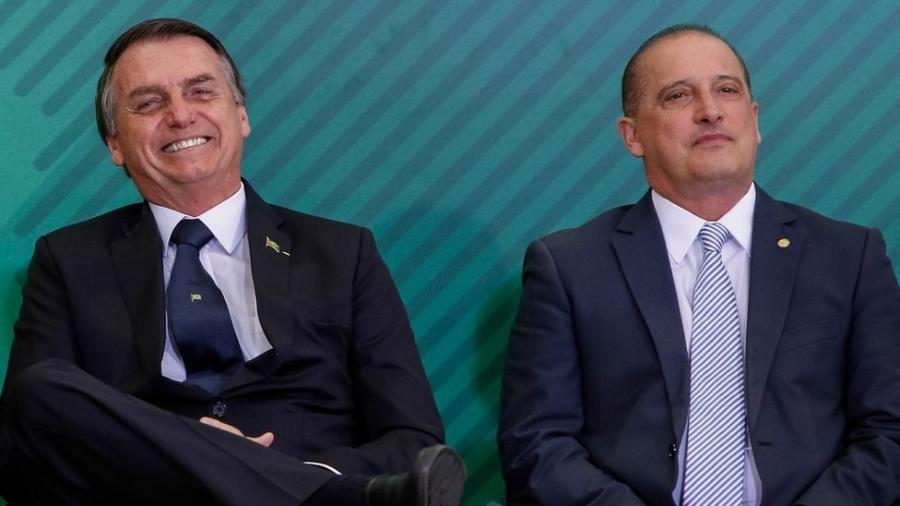Jair Bolsonaro com Onyx Lorenzoni: portaria assinada pelo ministro confunde liberdade de escolha e problema de saúde pública - Alan Santos/PR