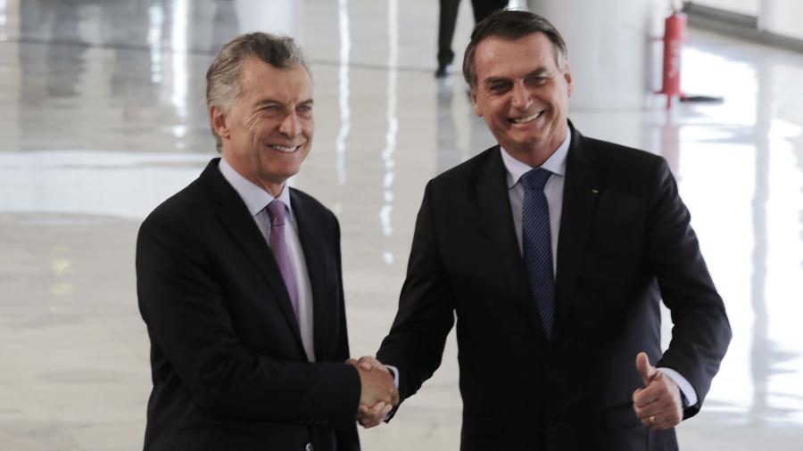 O presidente Jair Bolsonaro (PSL), à direita, recebe o presidente da Argentina, Mauricio Macri, no Palácio do Planalto, em Brasília  - Fátima Meira/Estadão Conteúdo