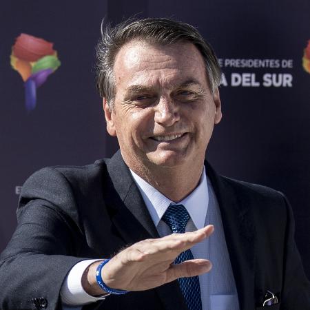 O presidente Jair Bolsonaro chega a Santiago, no Chile - Martin Bernetti/AFP