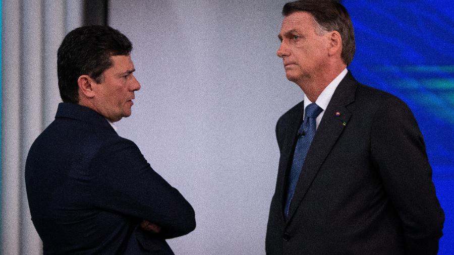 Sergio Moro e Jair Bolsonaro antes do debate da TV Globo, durante a campanha de 2022