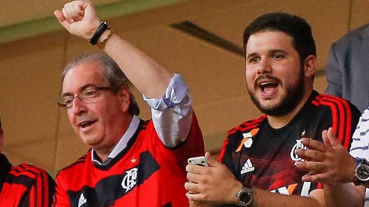 17.set.2015 - Eduardo Cunha, então presidente da Câmara, e Hugo Motta assistem a jogo do Flamengo em Brasília, em 2015 