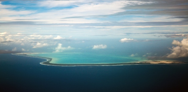Kiribati, país remoto no Pacífico, começa a sentir os efeitos da elevação do mar - Josh Haner/The New York Times