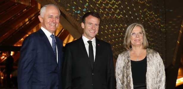 Presidente da França, Emmanuel Macron, ao lado do premiê da Austrália, Malcolm Turnbull e de sua mulher, Lucy - Ludovic Marin/AFP