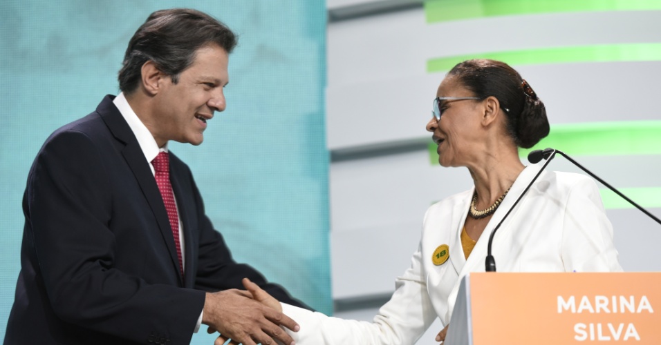 20.set.2018 - Fernando Haddad e Marina Silva durante debate da TV Aparecida