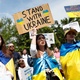 A woman protests the war in Ukraine at a demonstration in Budapest, Hungary - Bernadett Szabo/Reuters