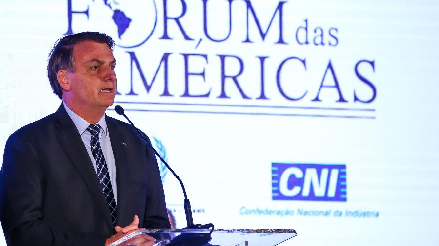 10.mar.2020 - O presidente Jair Bolsonaro discursa na abertuda do Fórum das Américas, em Miami (EUA) - Zak Bennett/AFP