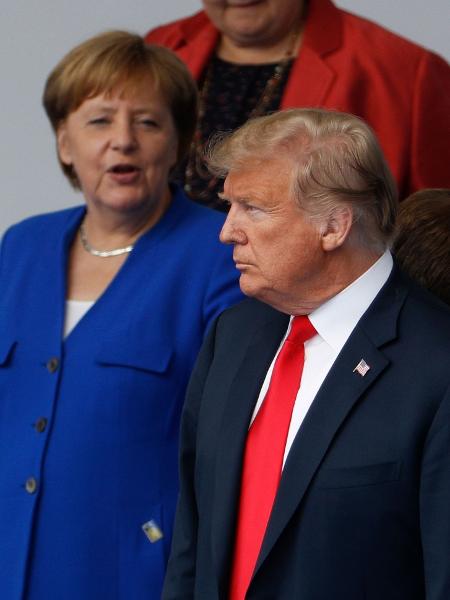 11.jul.2018 - Donald Trump, presidente dos Estados Unidos, ao lado da premiê da Alemanha, Angela Merkel - AFP PHOTO / GEOFFROY VAN DER HASSELT