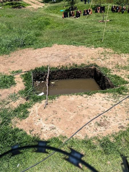 A fonte de água usada para dar de beber aos internos