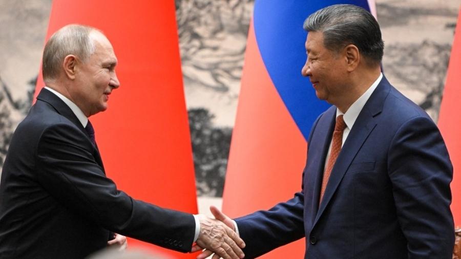 Putin e Xi Jinping se encontram na China