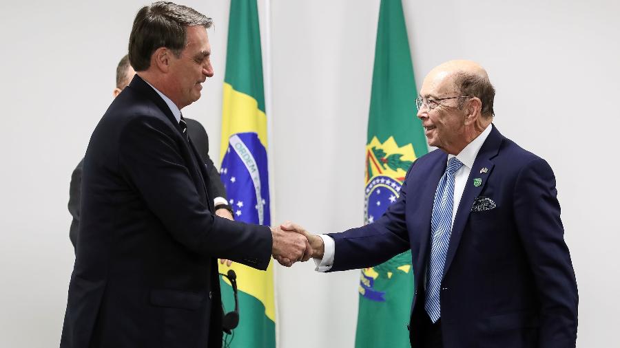 31.jul.2019 - Bolsonaro recebe o secretário de comércio dos Estados Unidos, Wilbur Ross (à dir.), no Palácio do Planalto - Marcos Corrêa/Presidência da República/AFP