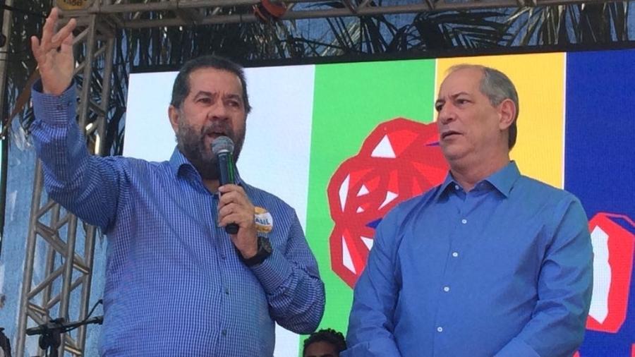 Carlos Lupi (à esquerda) anunciou a decisão neste sábado (12) - Felipe Amorim / UOL