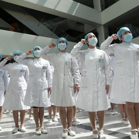 Enfermeiras em evento em Wuhan - CHINA DAILY/REUTERS