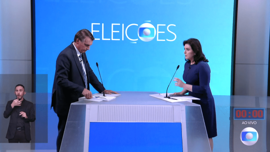 29.set.2022 - Jair Bolsonaro (PL) questiona Simone Tebet (MDB) no debate entre candidatos à Presidência da República. - Reprodução/TV Globo