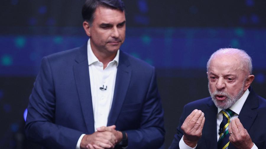 Flávio Bolsonaro e Luiz Inácio Lula da Silva no debate da Band Flávio Bolsonaro e Luiz Inácio Lula da Silva no debate da Band