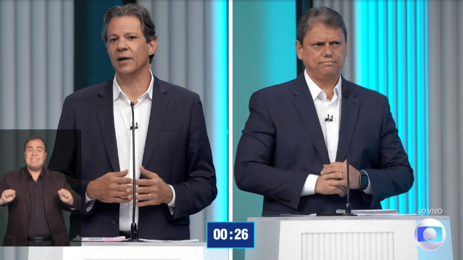 Fernando Haddad (PT) e Tarcísio de Freitas (Republicanos), candidatos ao governo de São Paulo, participam de debate na TV Globo no primeiro turno - Reprodução/TV Globo