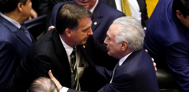 6.nov.2018 - Bolsonaro e Temer juntos durante sessão solene no Congresso - Adriano Machado/Reuters
