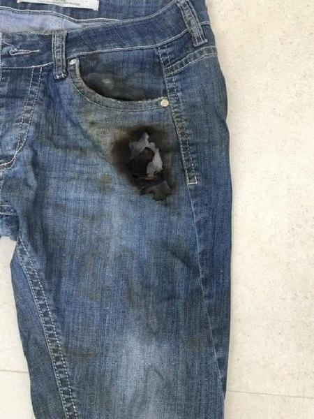 Celular estava no bolso da calça jeans - Reprodução/Extra