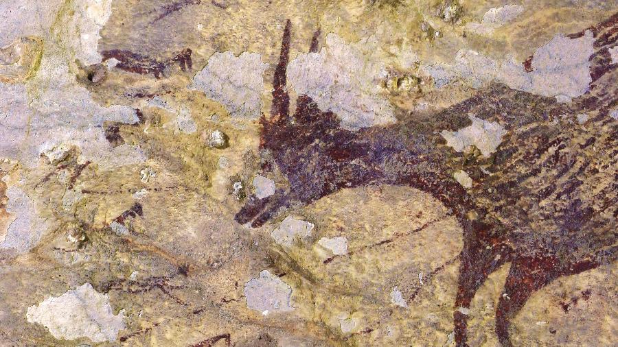 Pintura ruprestre de 44 mil anos é encontra na Indonésia com representação de teriantropos - AFP PHOTO/RATNO SARDI/GRIFFITH UNIVERSITY 